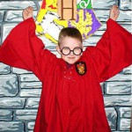 Boy dressed as Harry Potter at birthday party